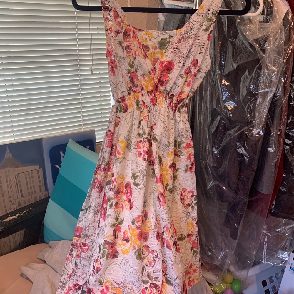 White lace dress with bright flowers